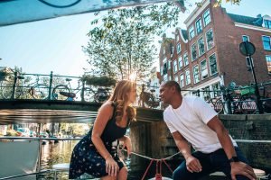 a couple on the romantic boat tour in Amsterdam