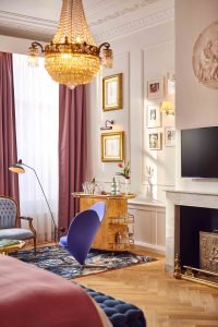 romantic hotels in Amsterdam for your proposal a fire place sitting in a living room