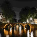 canal at night in amsterdam