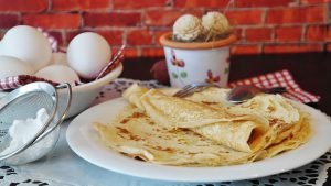 Eating pancakes with your love for breakfast in Amsterdam