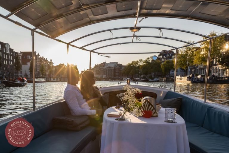 couple at sunset in Amsterdam during their day in amsterdam