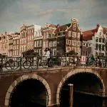 Beautifull bridge by historical canalsge over a body of water