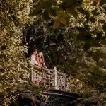 Classical bridge in park photoshoot couple