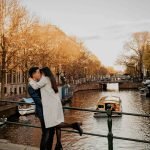 Engaged couple at classical bridge canals