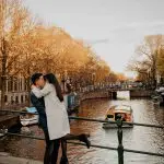 Engaged couple at classical bridge canals